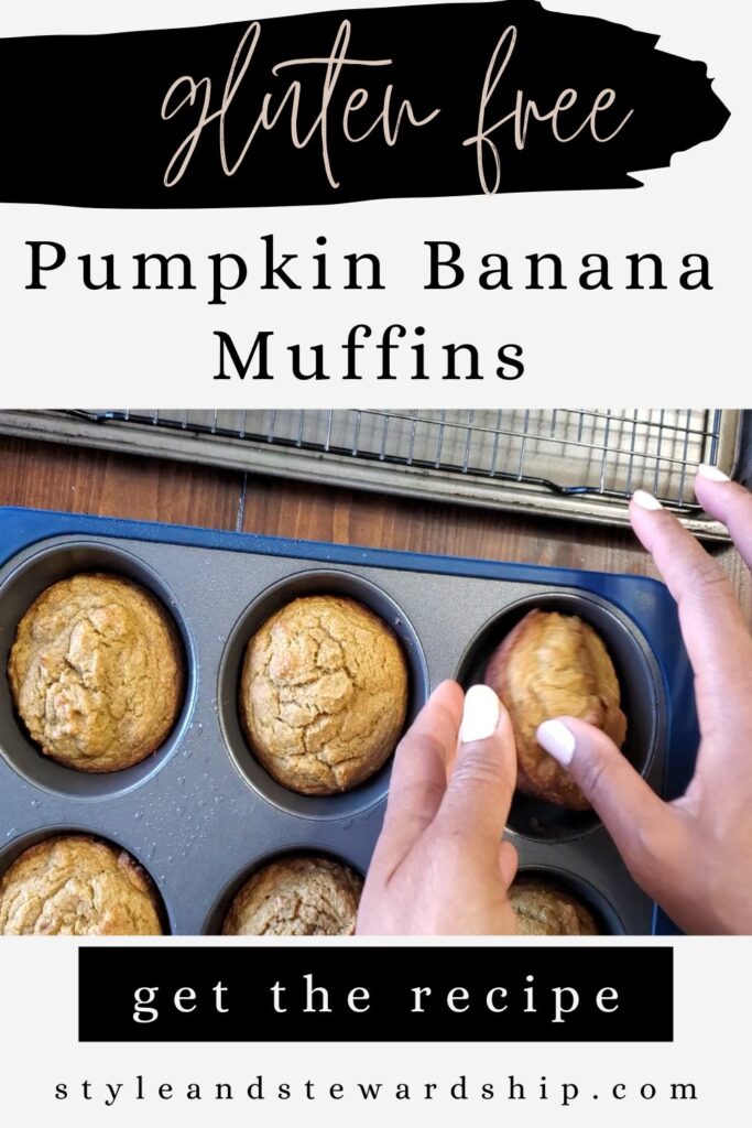 Muffins in a pan being removed by someone's hands.