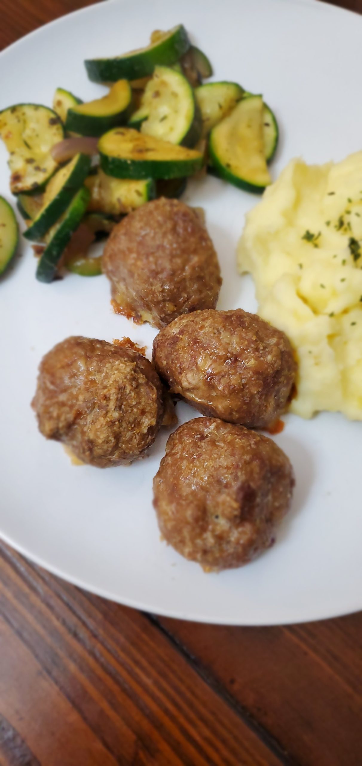 a plate of meatballs mashed potatoes and zucchini style and stewardship dot com sheet pan gluten-free meatballs and dairy-free mashed potatoes