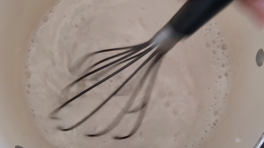Whisking almond milk