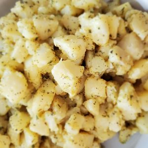 white bowl filled potato salad