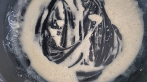 cast iron pan with a gravy roux mixture