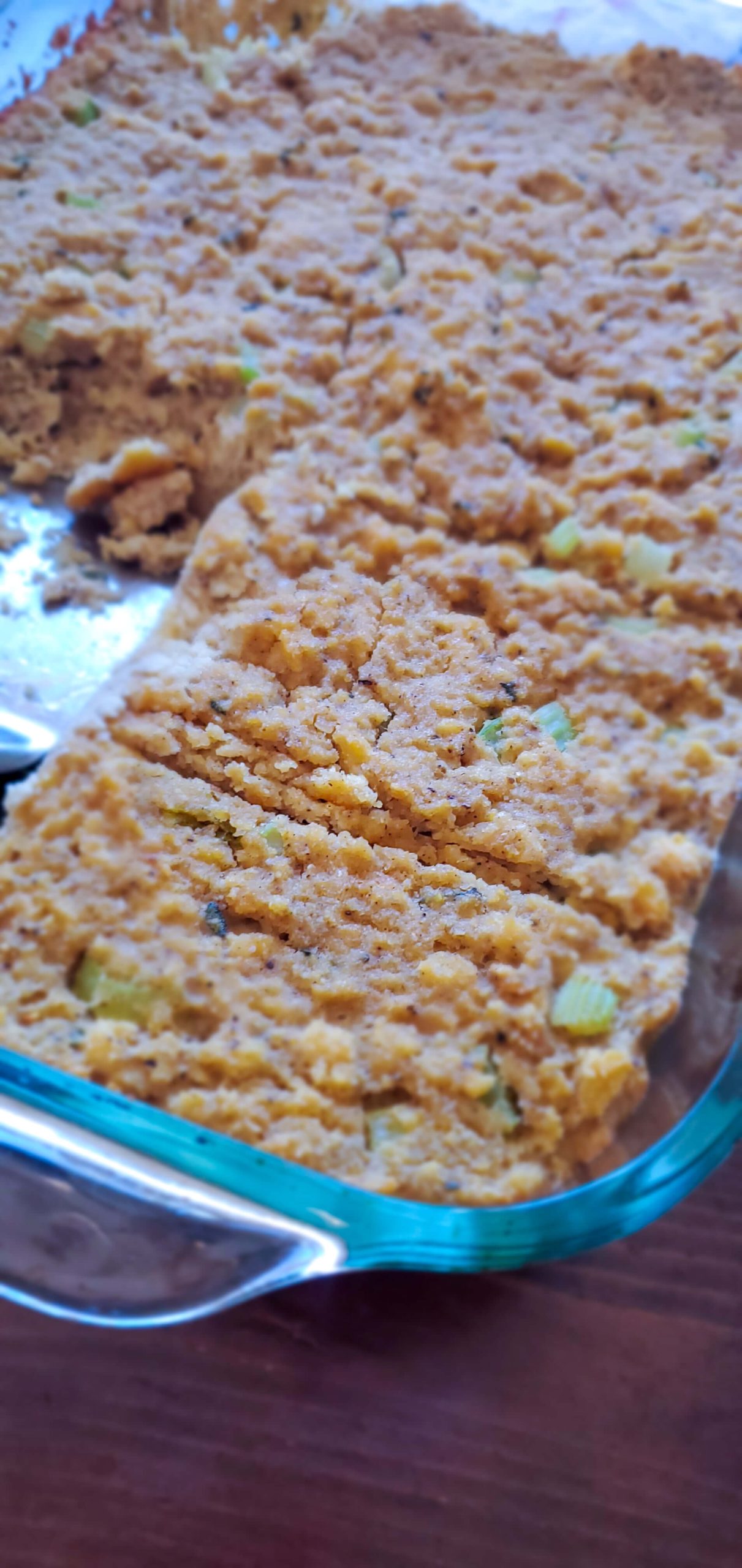 A large casserole dish of gluten-free cornbread dressing.